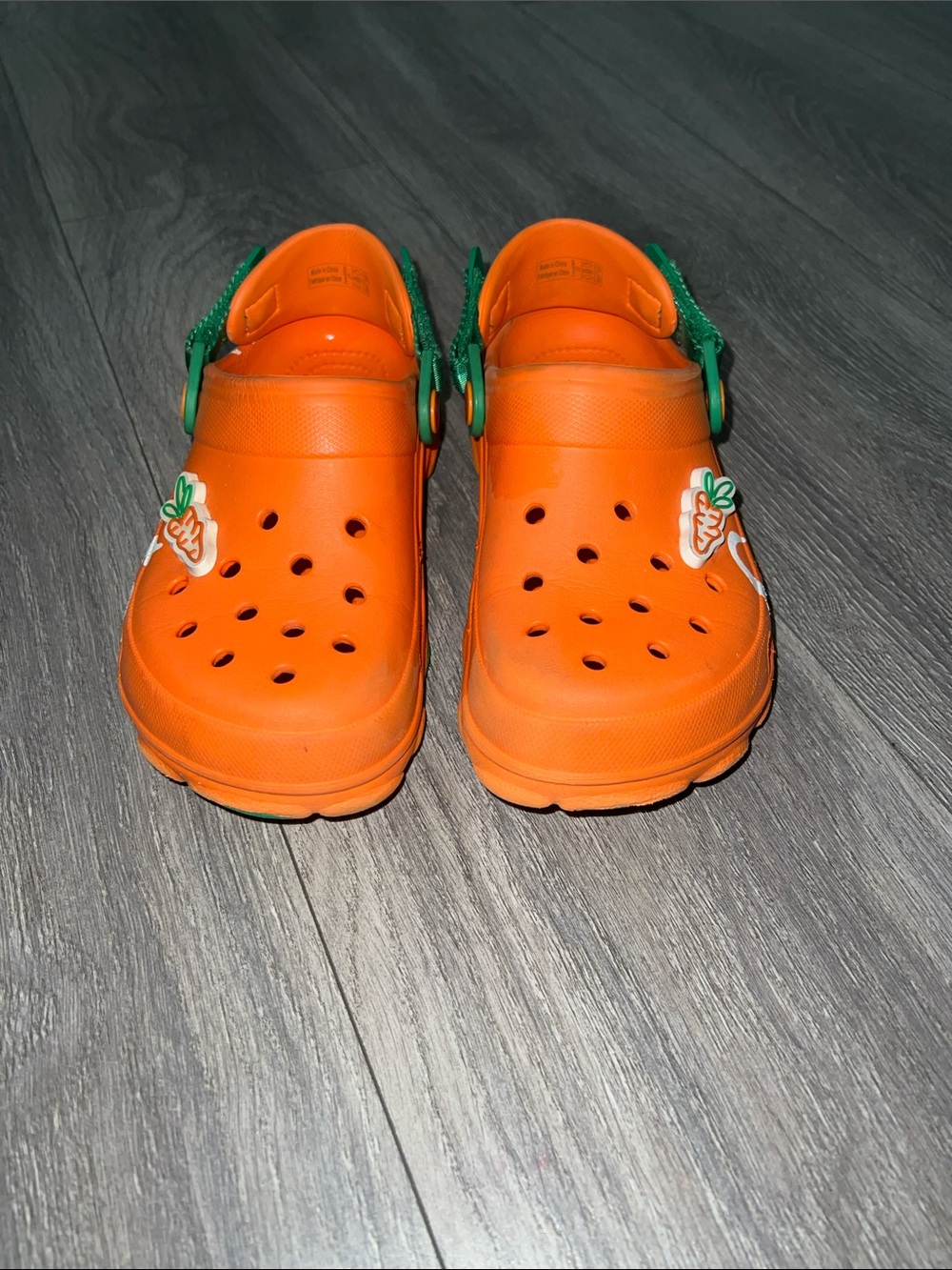 CROCS Kids Orange Clogs with Green Heel Straps